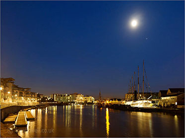 SS Great Britain at night with moon