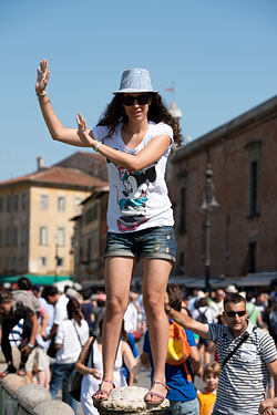 People Posing by The Leaning Tower of Pisa