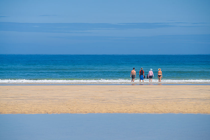 People on the beach, Porthkidney